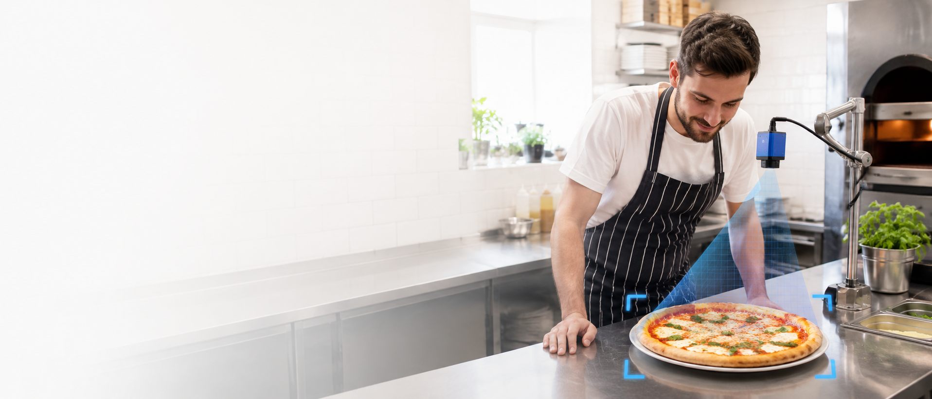 Small restaurant kitchen using a camera-based AI check on a pizza order